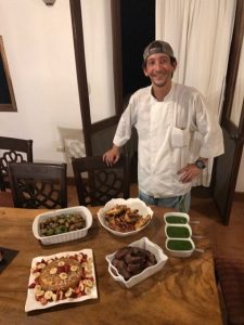 Chef presenting prepared dishes